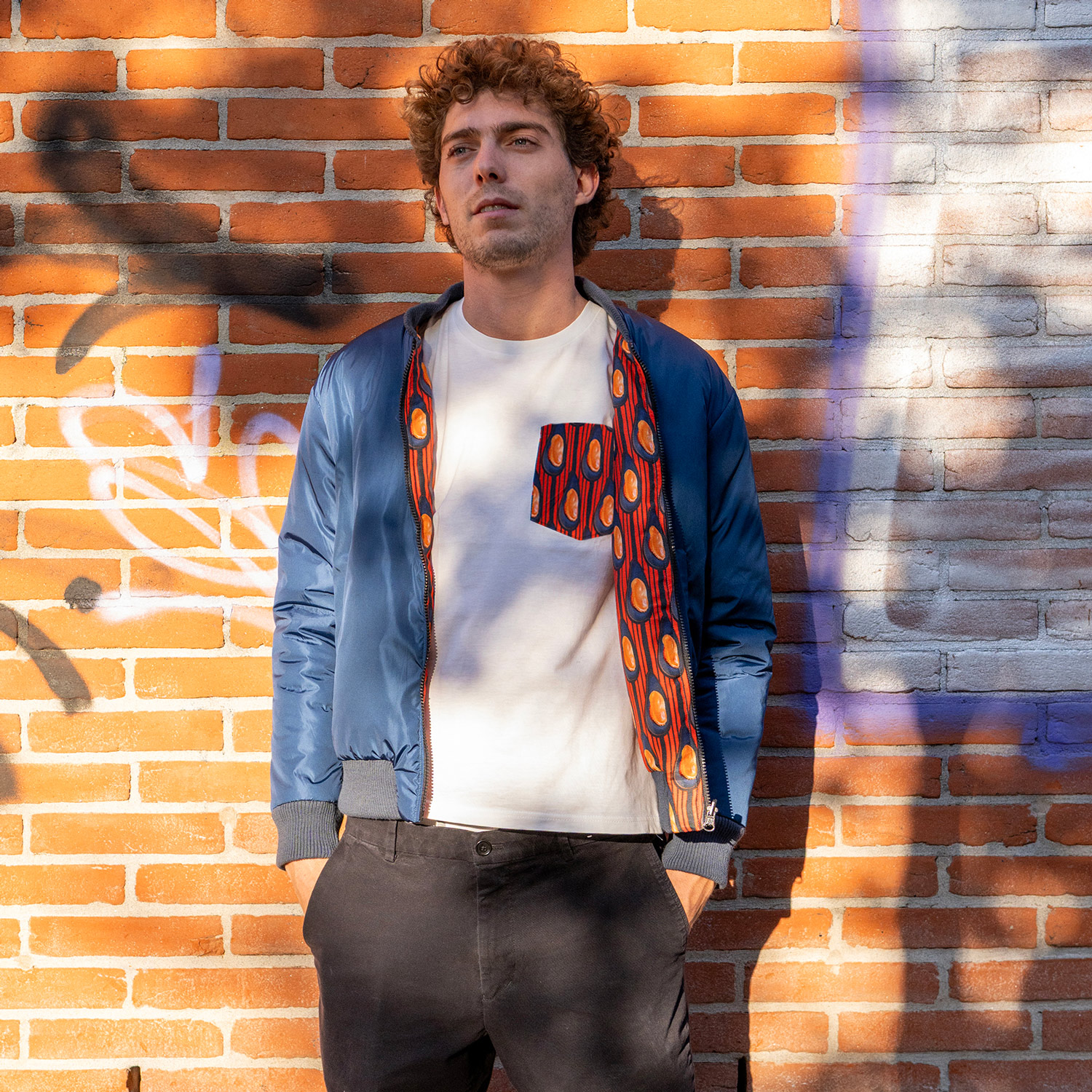 maglietta con taschino cozzy wax bomberz orange fiber coopertiva alice sartoria san vittore giuseppe beppe viscardi